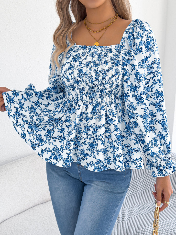 Damebluse med bred pasform og florale detaljer Stilla