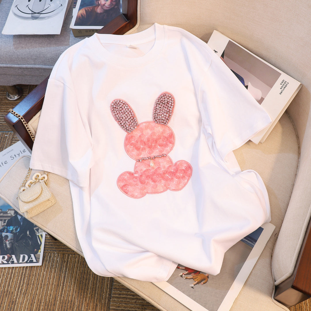Dame T-shirt med funklende kaninmotiv og løstsiddende pasform Stilla