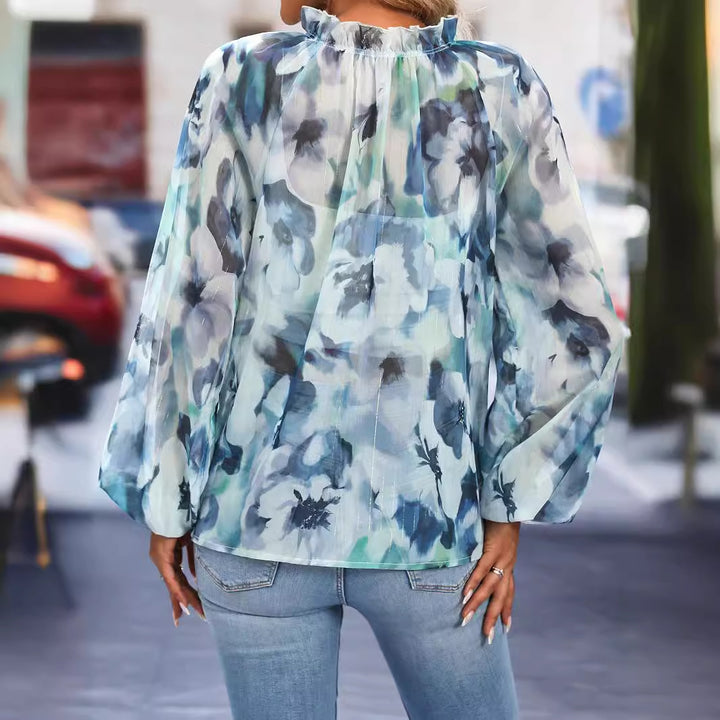 Dame gennemsigtig bluse med blomstret tryk Stilla