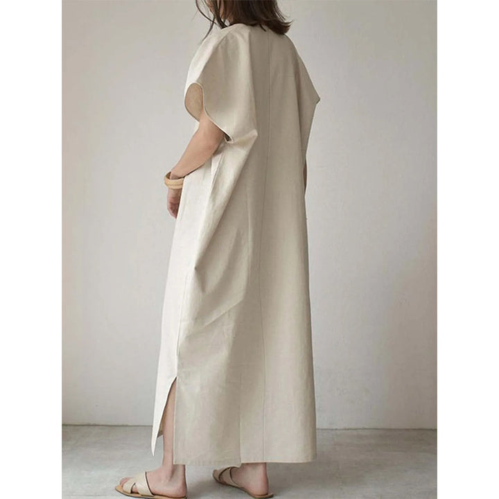 Dame Maxi-kjole med dyb V-hals og sideslids Stilla