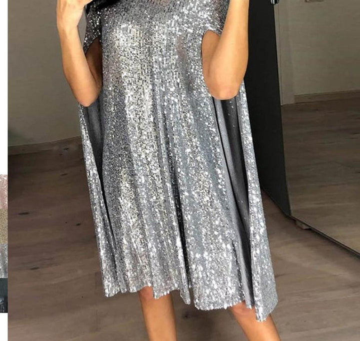 Dame aftenkjole med glitrende cape-snit og glamourøse pailletter stil