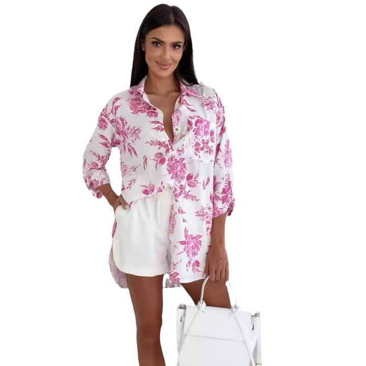 Damebluse med feminint blomsterprint og let oversized snit Stilla