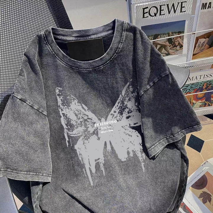 Dame Oversized T-shirt med kunstnerisk sommerfugledesign Stilla