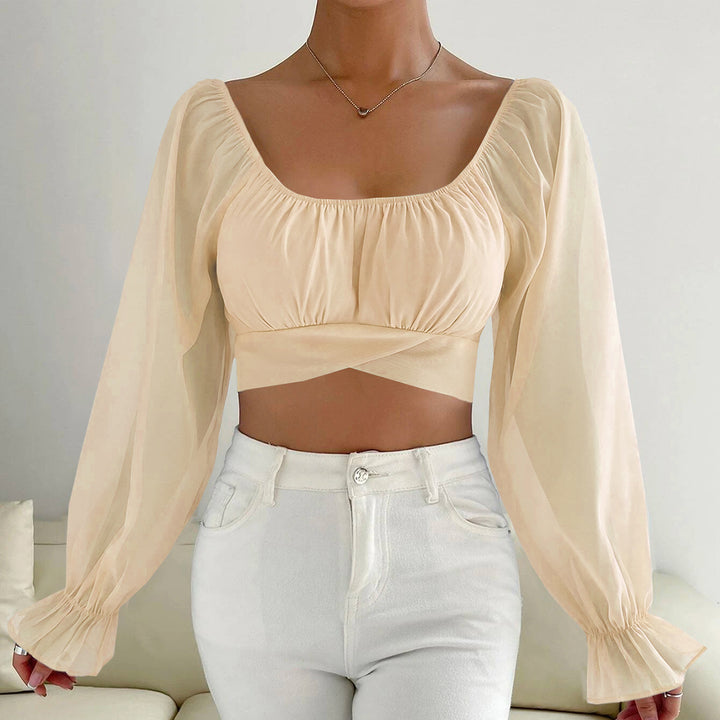 Damer cropped bluse med puffærmer og raffineret snit Skovae
