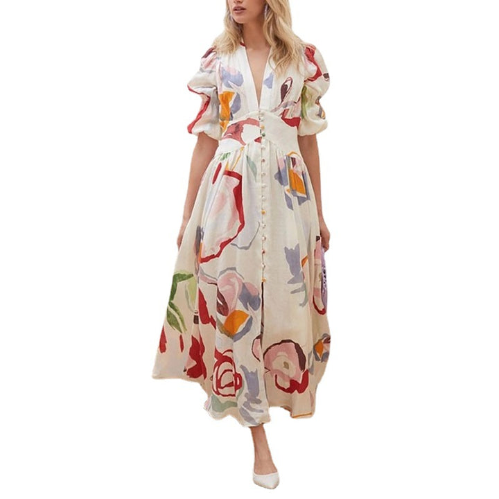 Dame Maxi-kjole med iøjnefaldende floralt design og volumetriske ærmer Stilla