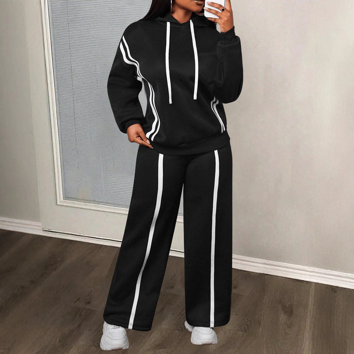 Kvinders sporty loungewear sæt med opfoldede ærmer og sidelister Skovae