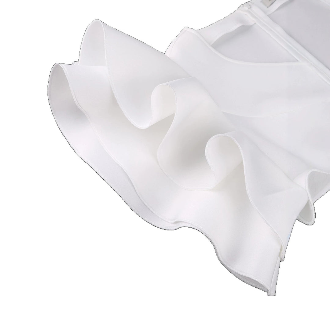 Damekjole med voluminøse flæser og asymmetrisk kant Skovae