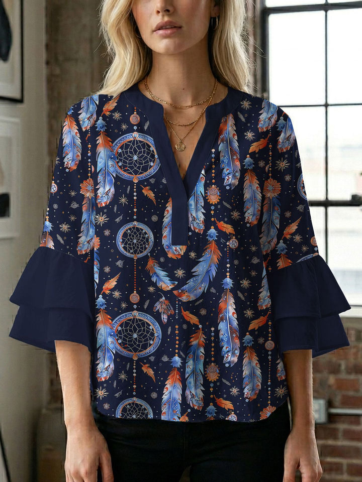 Dame bluse med voluminøse ærmer og kreativt trykdesign Skovae