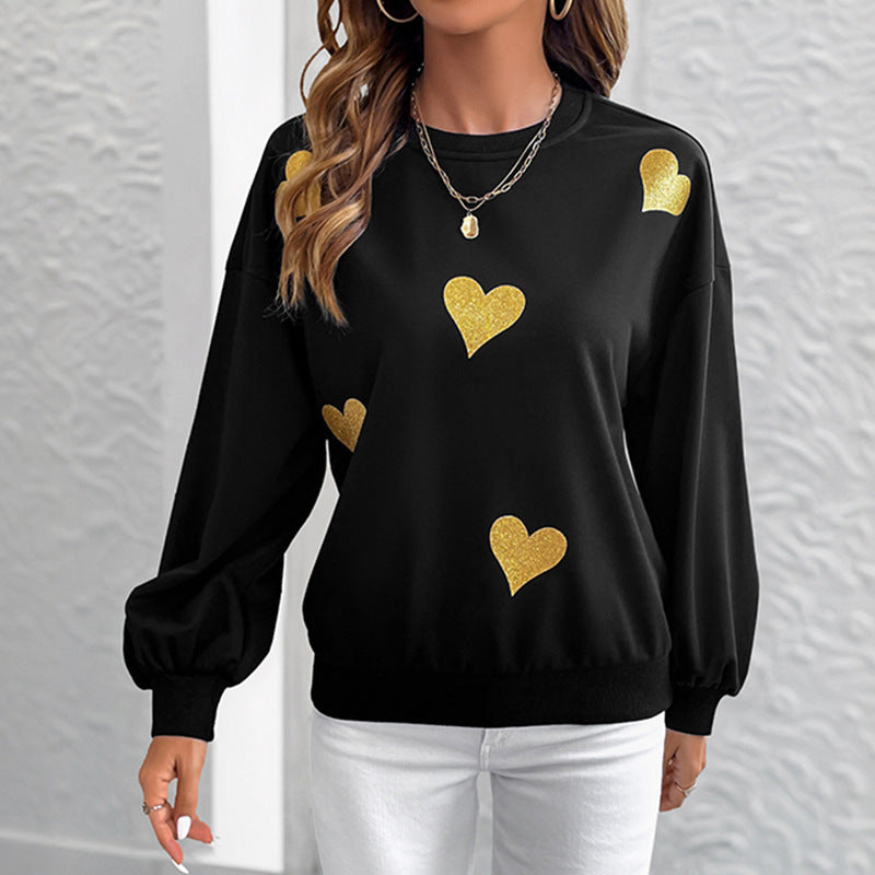 Dame mode sweatshirts med gyldent hjerteprint Stilla