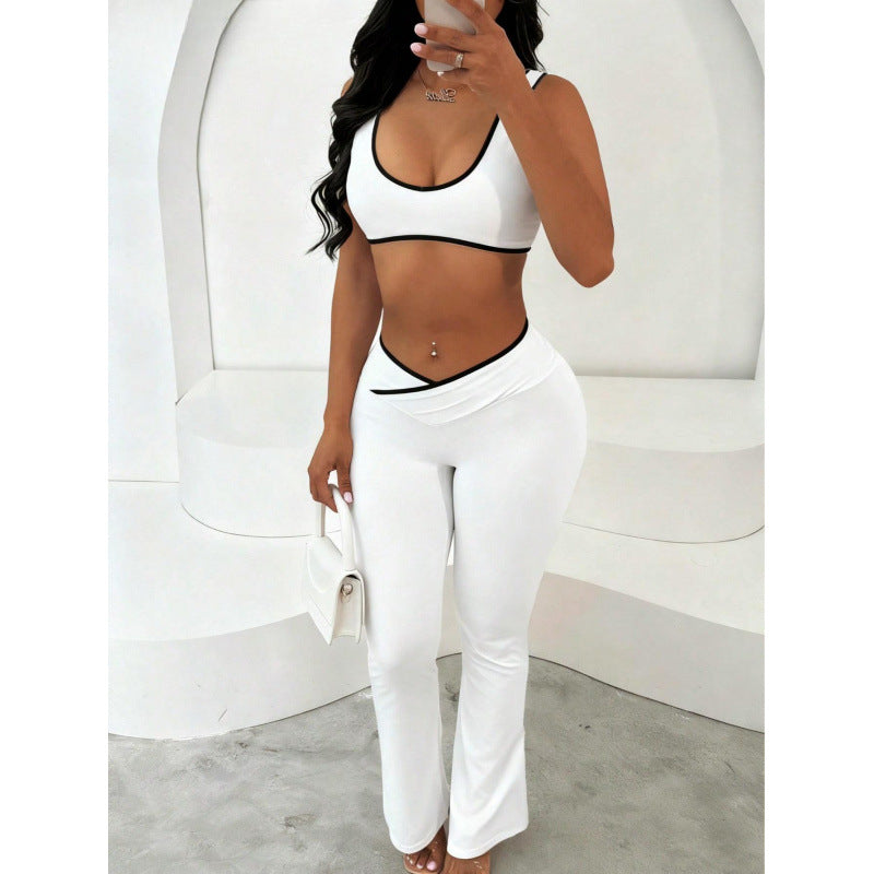 Damen Sportliches Zweiteiler Set mit kurzer Oberteil und flared Leggings Skovae