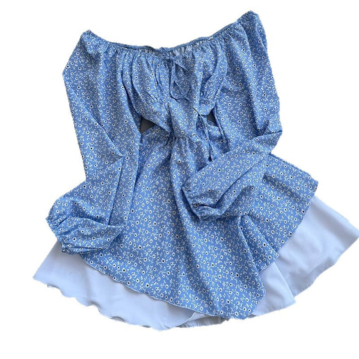 Damebluse med rynket ærme og blomsterdesign Stilla