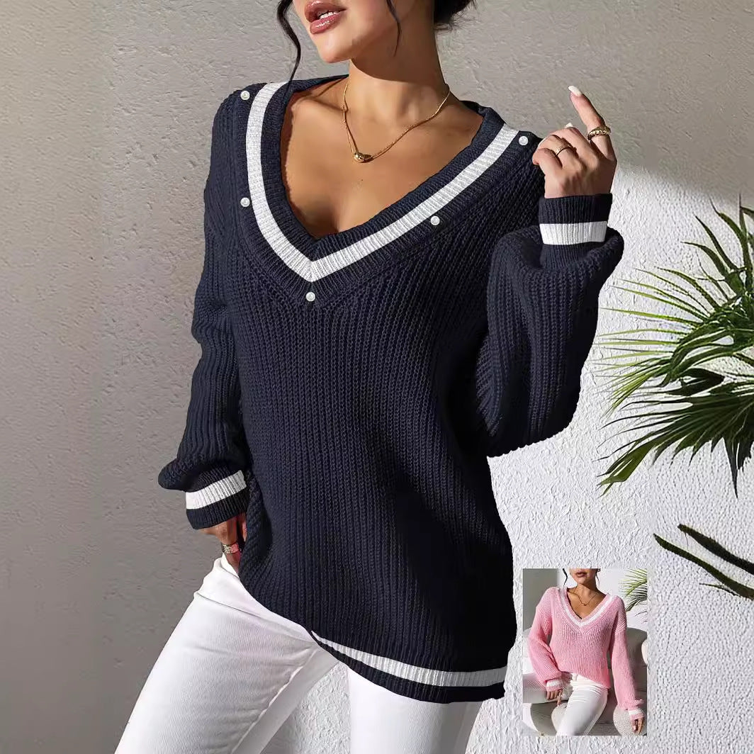 Dame oversized strikpullover med V-udskæring og elegante perledetaljer Stilla