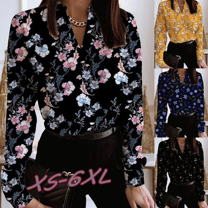 Damebluse med blomstret print og elegant krave Stilla