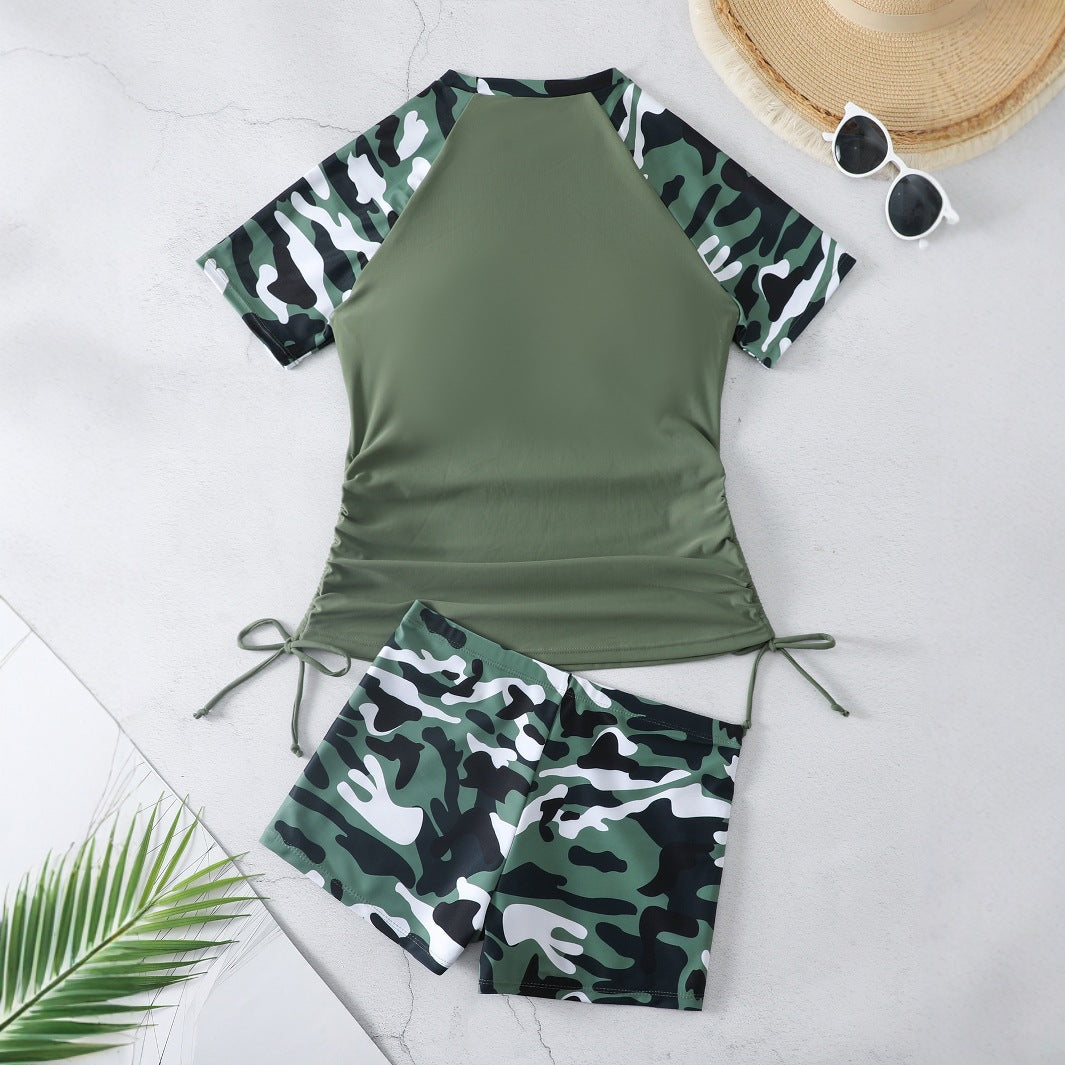 Dame sportoutfit med stilfuldt camouflage-design Stilla