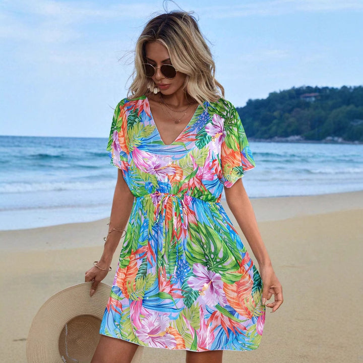 Dame Strandkjole med let chiffonmateriale og asymmetrisk design Stilla