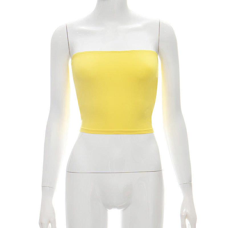 Dame bandeau-top i elastisk materiale med figurskabende snit Skovae