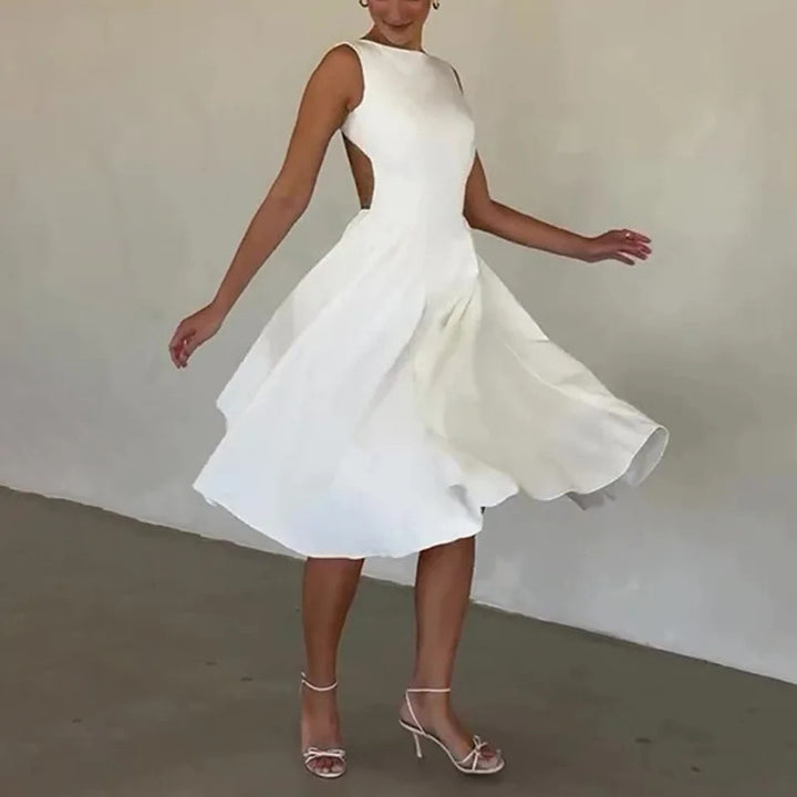 Damer Elegant Midi-kjole med tætsiddende overdel og svajende skørt Skovae