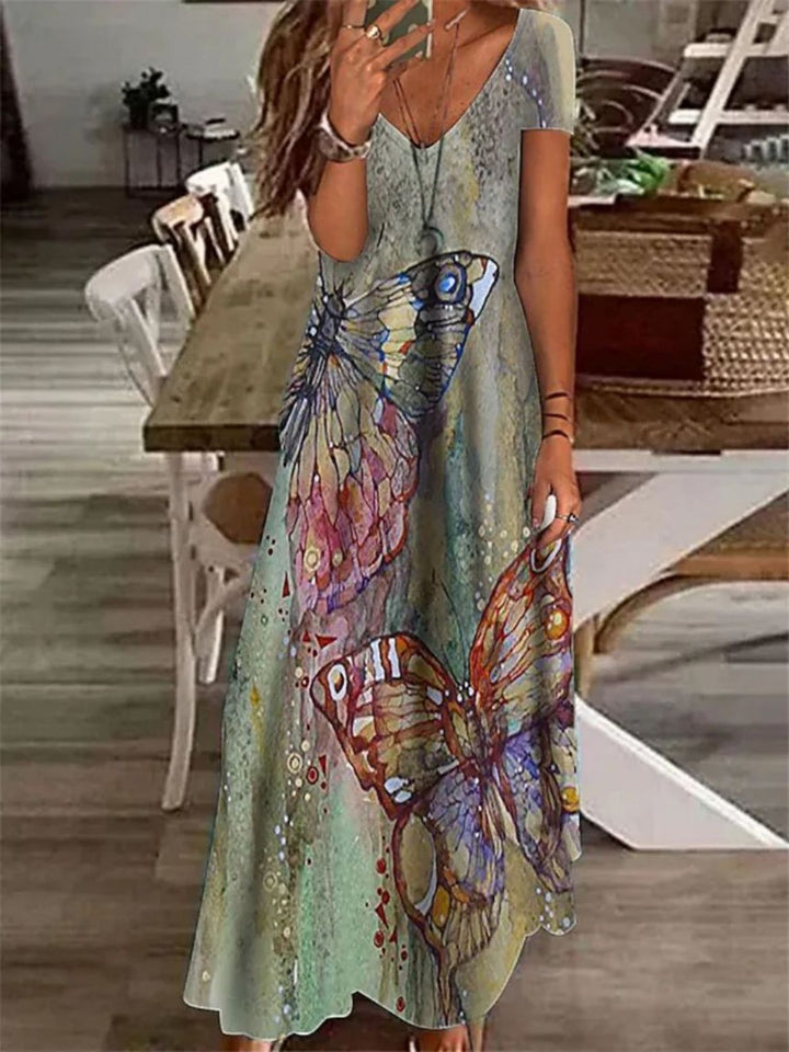 Dame Maxikjole med elegant V-hals og flydende snit Stilla
