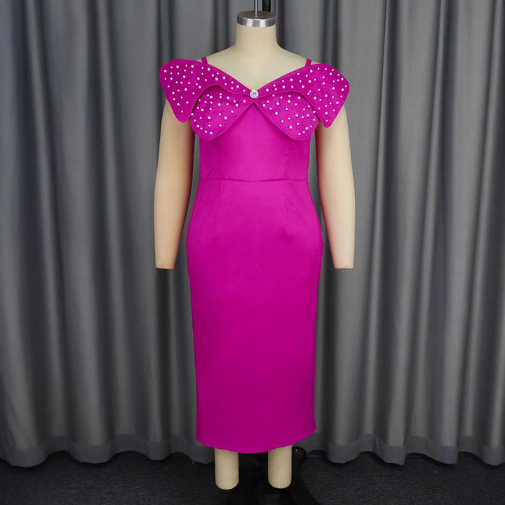 Damer Elegant aftenkjole med voluminøse sløjfarmer og glitrende strass detaljer Skovae