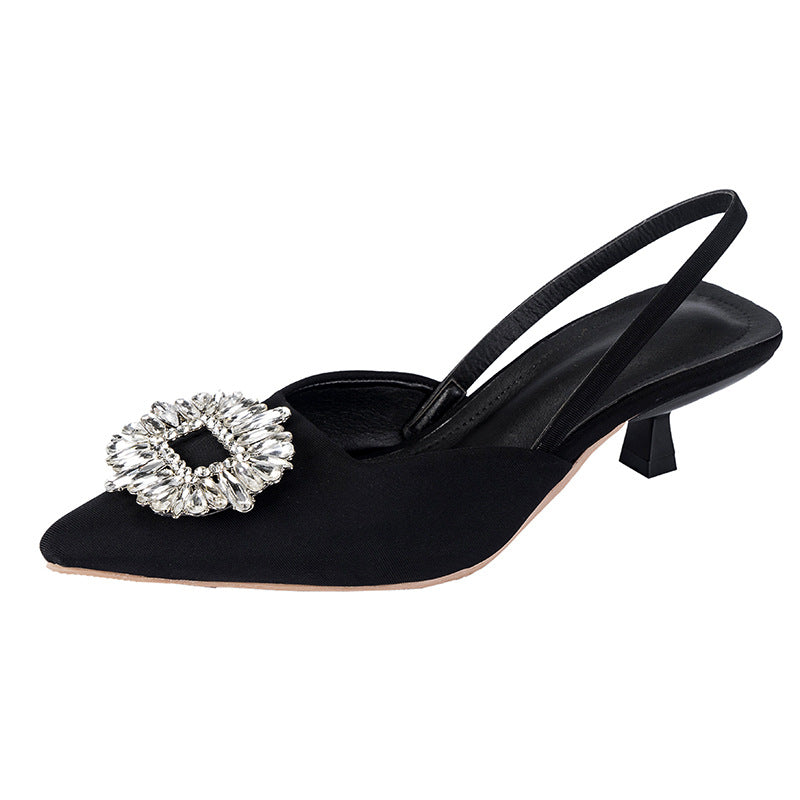 Dame Slingback-pumps med elegant spidsform og funklende smykke-detail Stilla