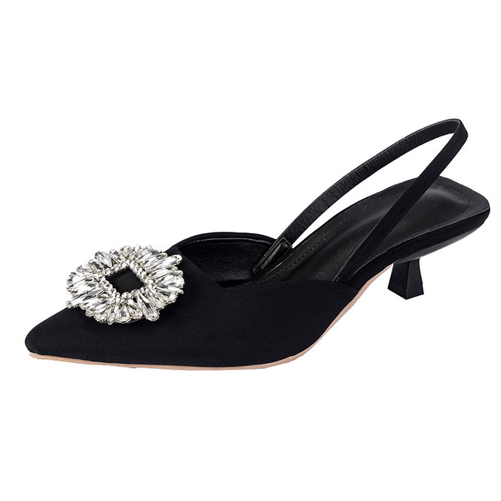 Dame Slingback-pumps med elegant spidsform og funklende smykke-detail Stilla