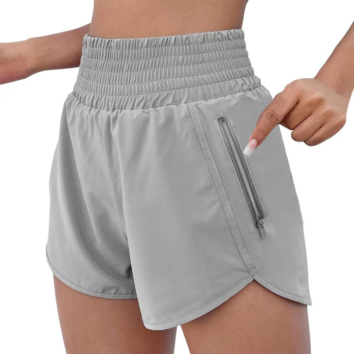 Dame sports-shorts med elastisk talje og praktiske lynlåslommer Stilla