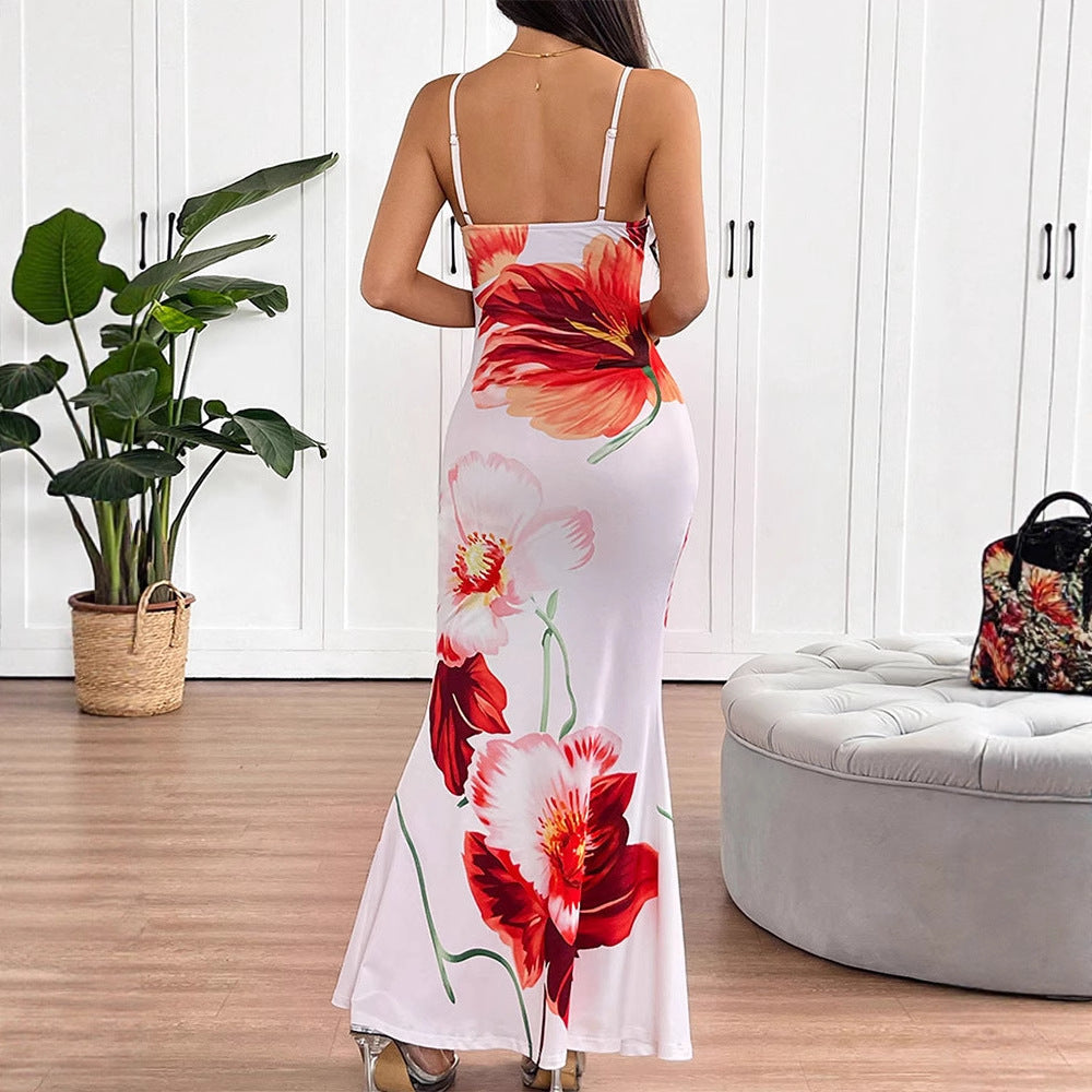 Dame maxikjole med elegant blomsterprint og delikate spaghetti-stropper Skovae