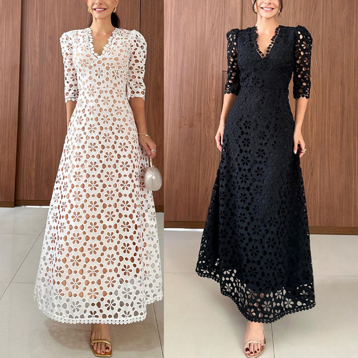 Dame spids-maxikjole med gennembrudt design og elegante puffærmer Stiila