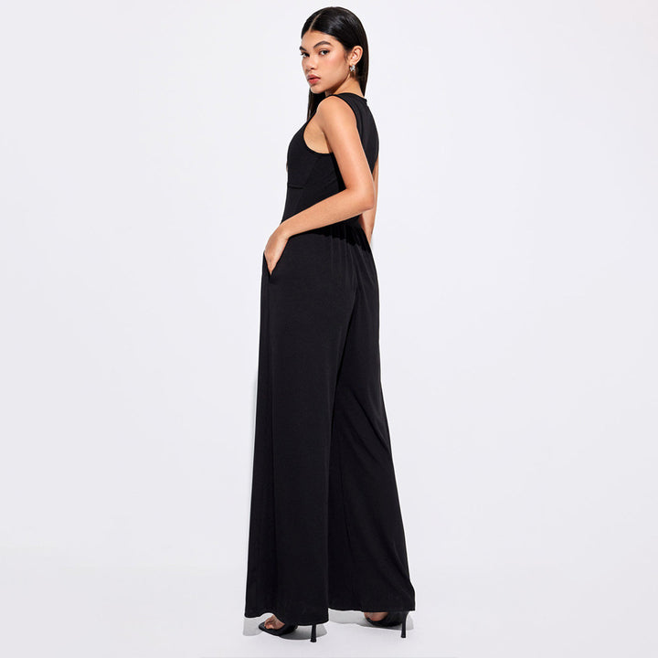 Dame jumpsuit med høj talje og praktiske sidelommer Stilla