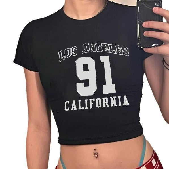 Dame Crop-T-shirt med sporty Los Angeles design Skovae