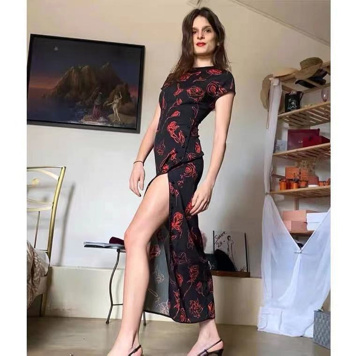 Dame midikjole med blomstertryk og elegant splitdesign Stilla