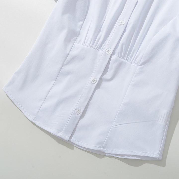 Femme Kortsleeve Bluse med knaplukning og puffærmer Stilla