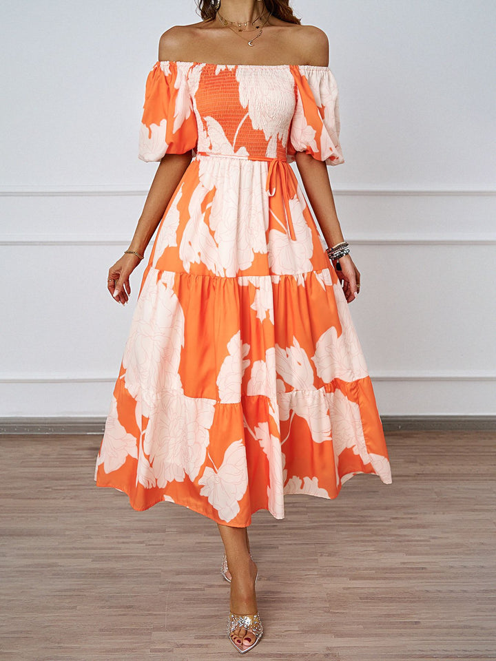 Dame sommerkjole med elegant puffærme-design og floralt mønster Stilla
