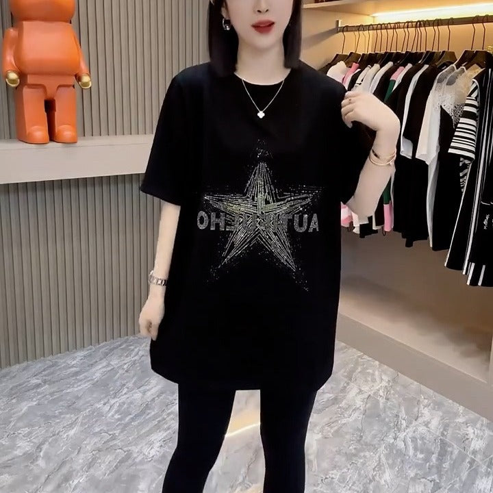 Dame T-shirt med glitrende stjernemotiv og afslappet oversized-snit Stilla
