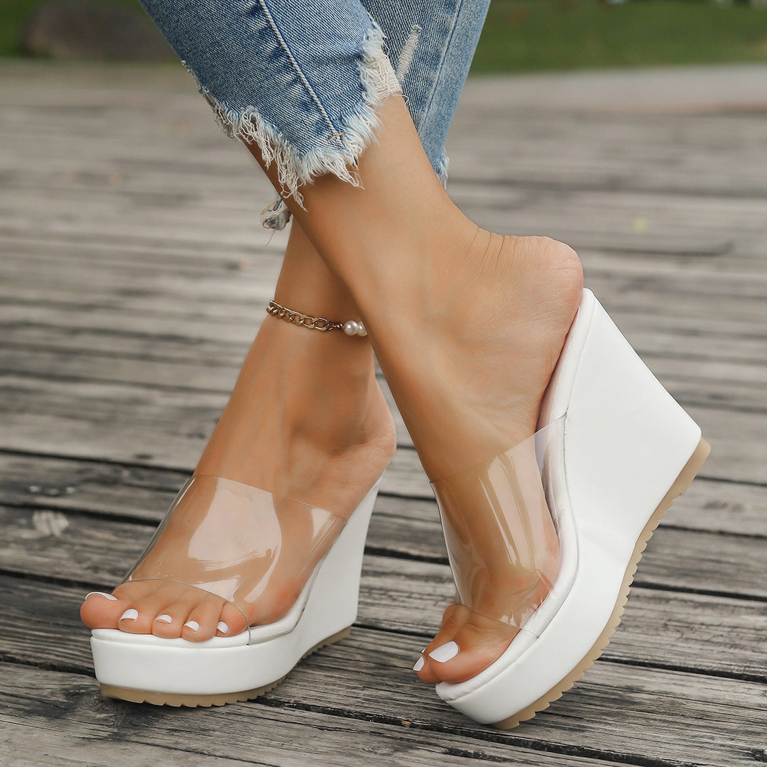 Dame nan transparente mules med PVC-dæksæler, høj kilehæle og skridsikre såler Skovae