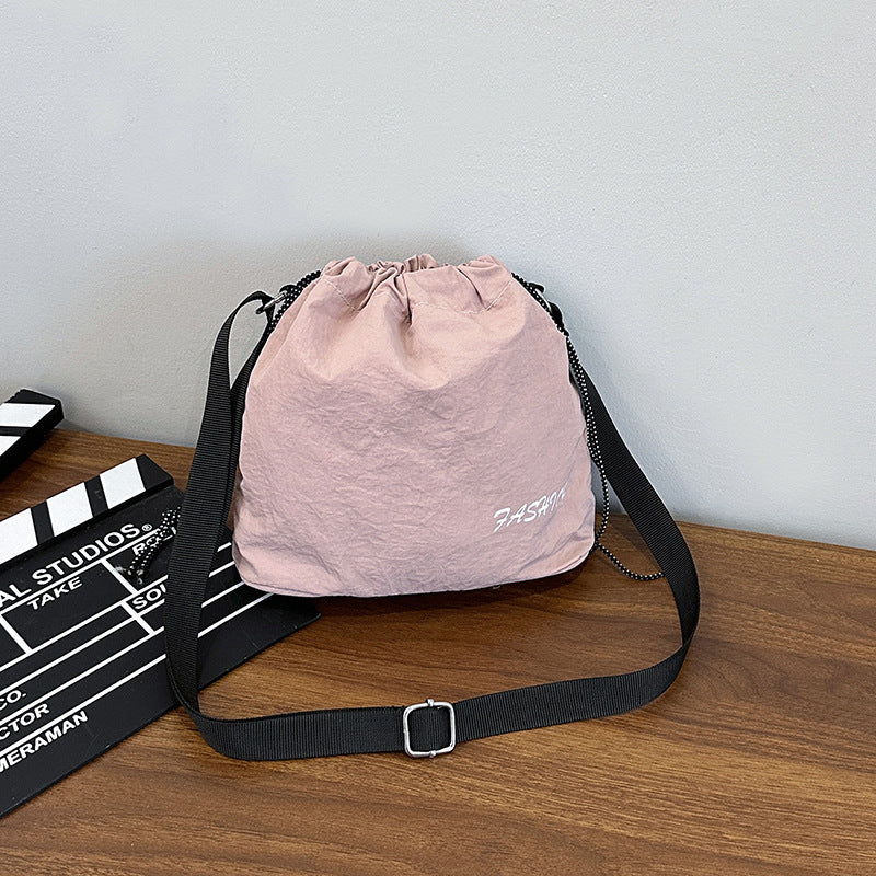 Femme Alsidig Snørebånd Bucket Bag Stilla