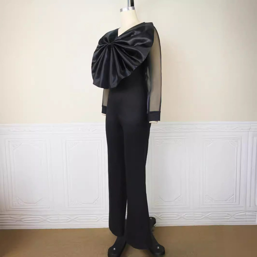 Dame elegant jumpsuit med voluminøs satinkrave og transparente ærmer Skovae