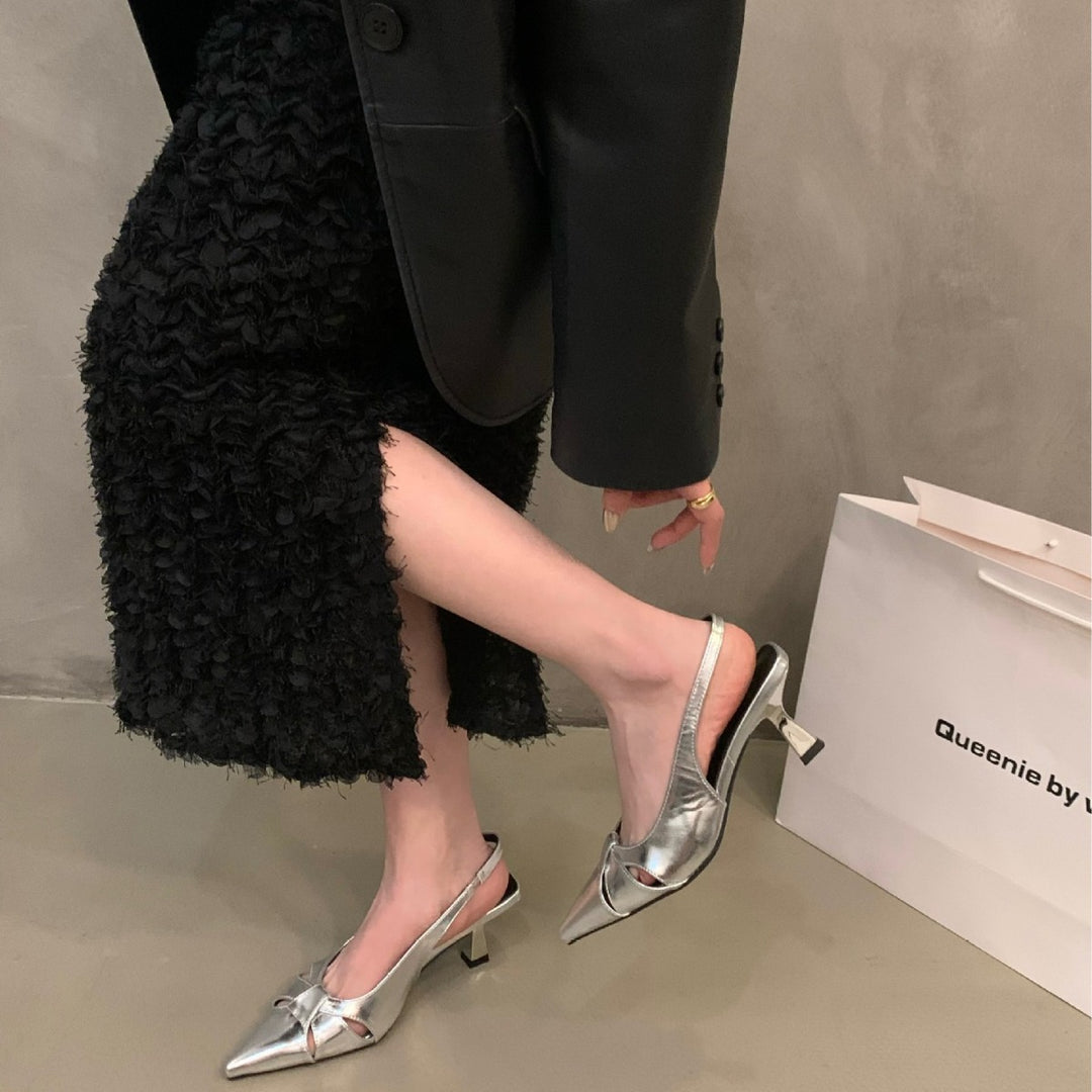 Dame Slingback-pumps med spids tåområde og dekorativt sløjfedesign Stilla