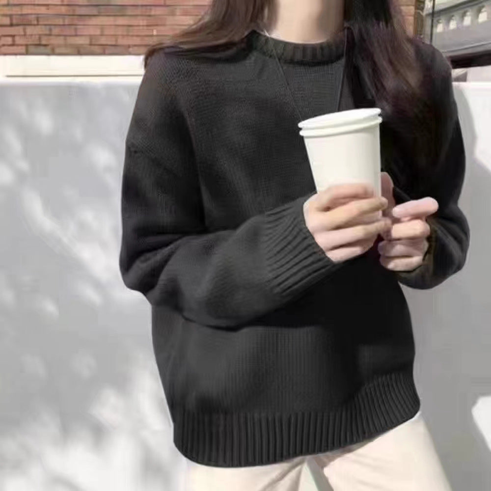 Kvinders hyggelige oversized sweater med rund halsudskæring og velkendt striktekstur Stilla