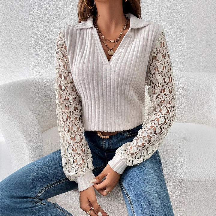 Damebluse med udsøgte spidsærmer og elegant struktur Stilla