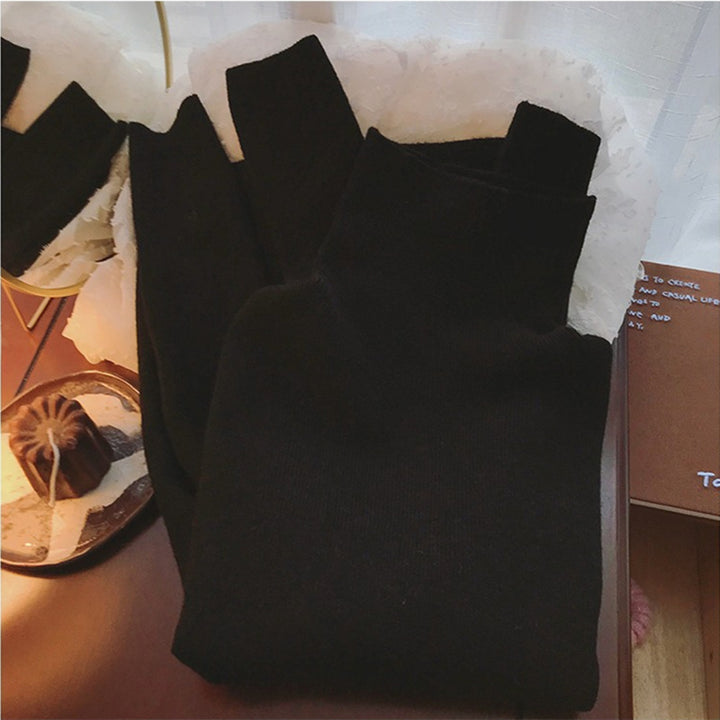 Kvinders Stand Collar Sweater lavet af fin ribstrik Stilla