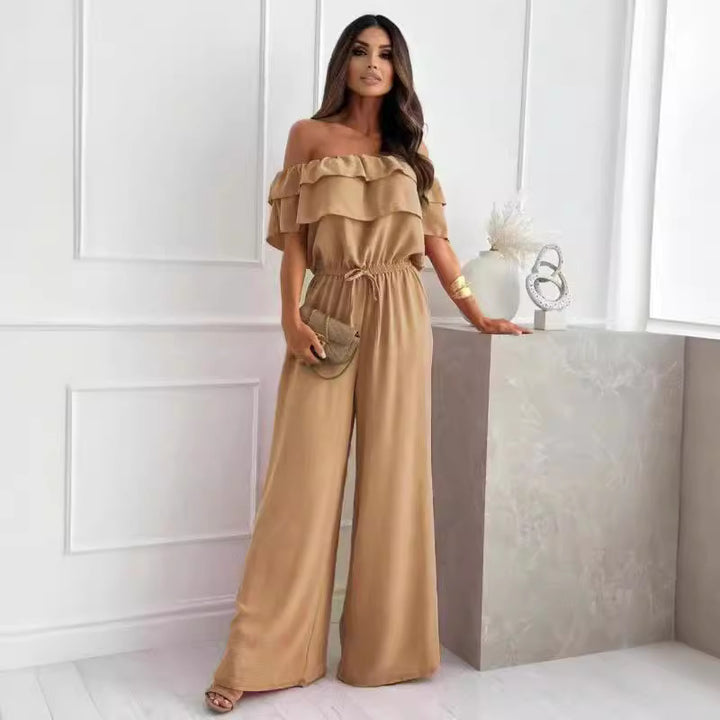 Dame jumpsuit med skulderfri design og bredt ben Stilla