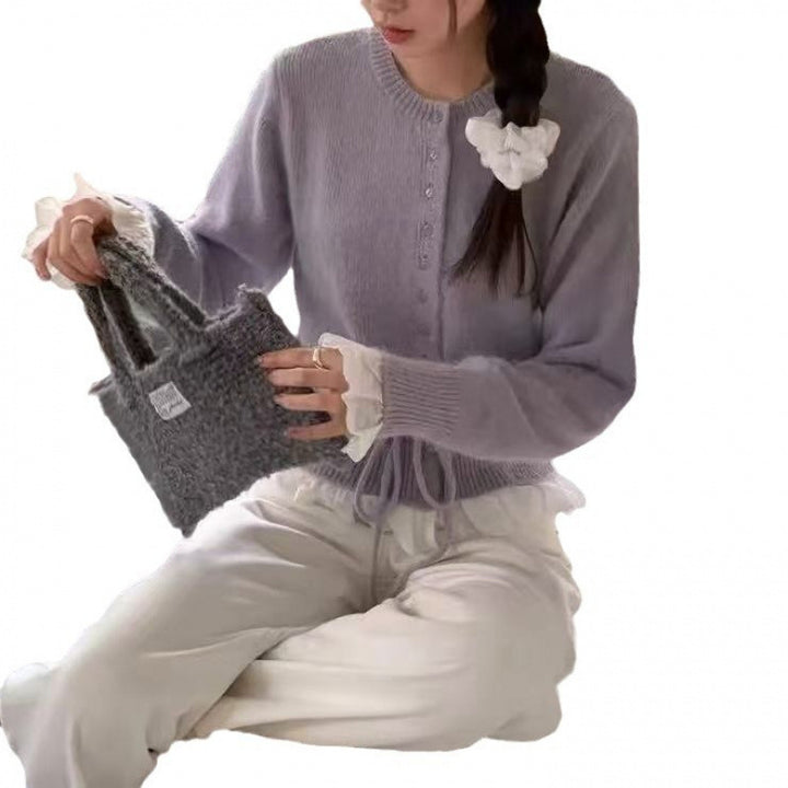 Kvinders cardigan med flæser og taljebånd Stilla