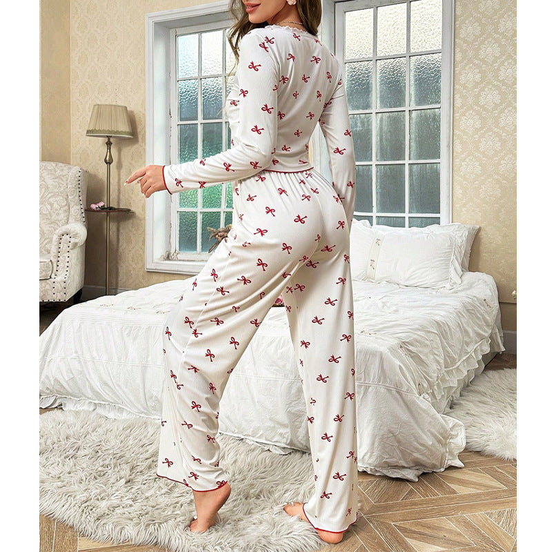 Dame pyjamasæt med legende sløjfemønstret Stilla
