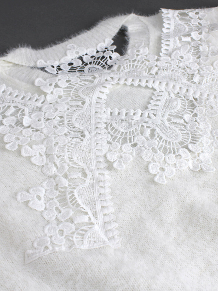 Dame strikpullover med elegant spids rygaccent Stilla