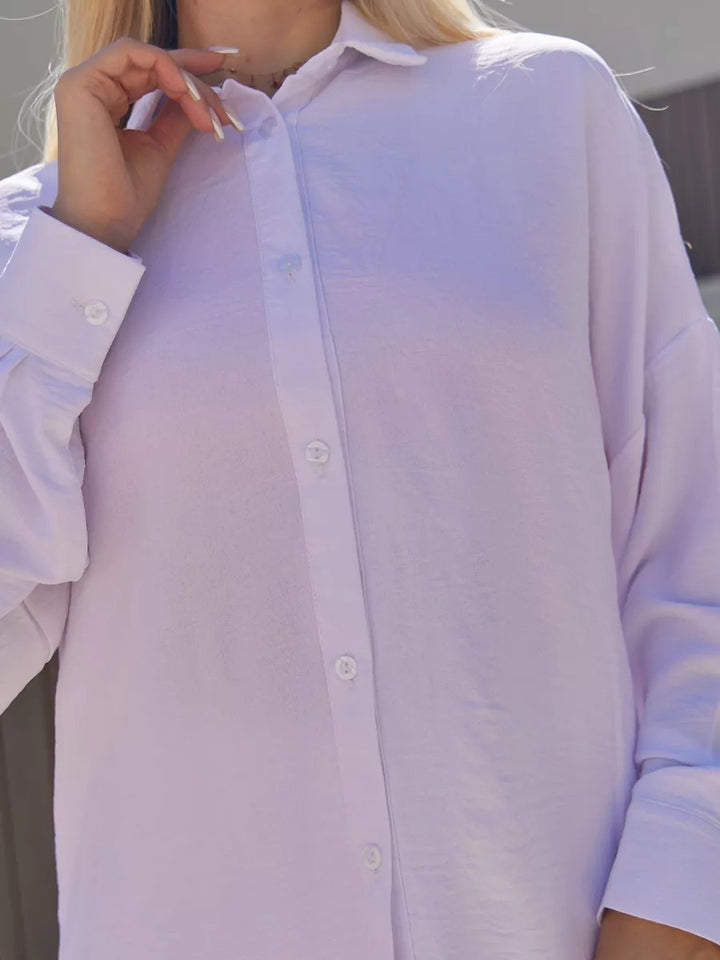 Dame Oversize Bluse med off-shoulder design og flydende snit Stilla