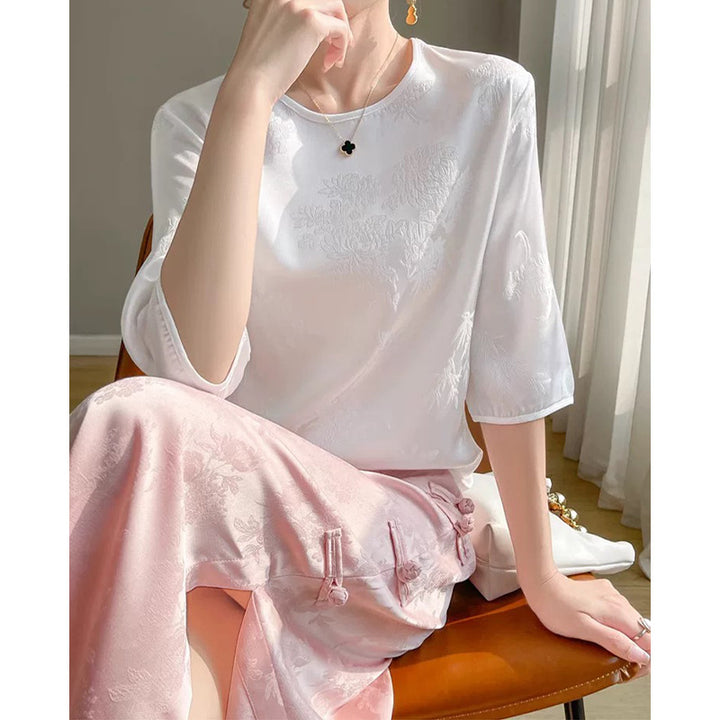 Damebluse med elegant broderi og fin struktur Stilla