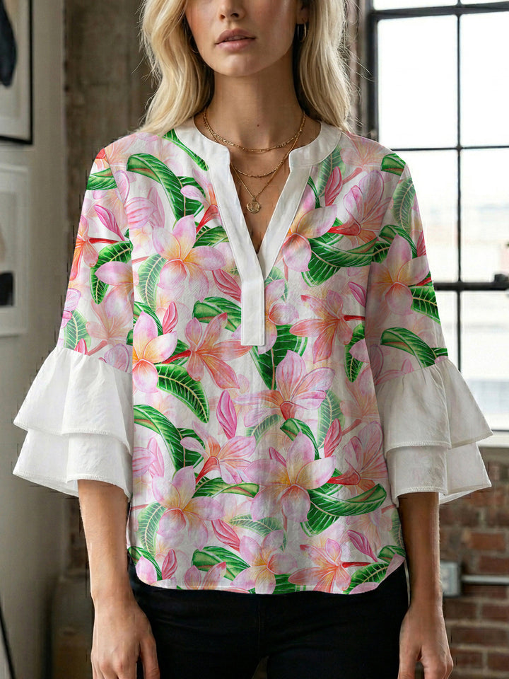Damebluse med voluminøse flæseærmer og blomstermønster Skovae