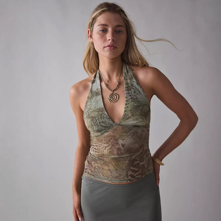 Dame Elegant og figursyet top i trendy mønster Skovae