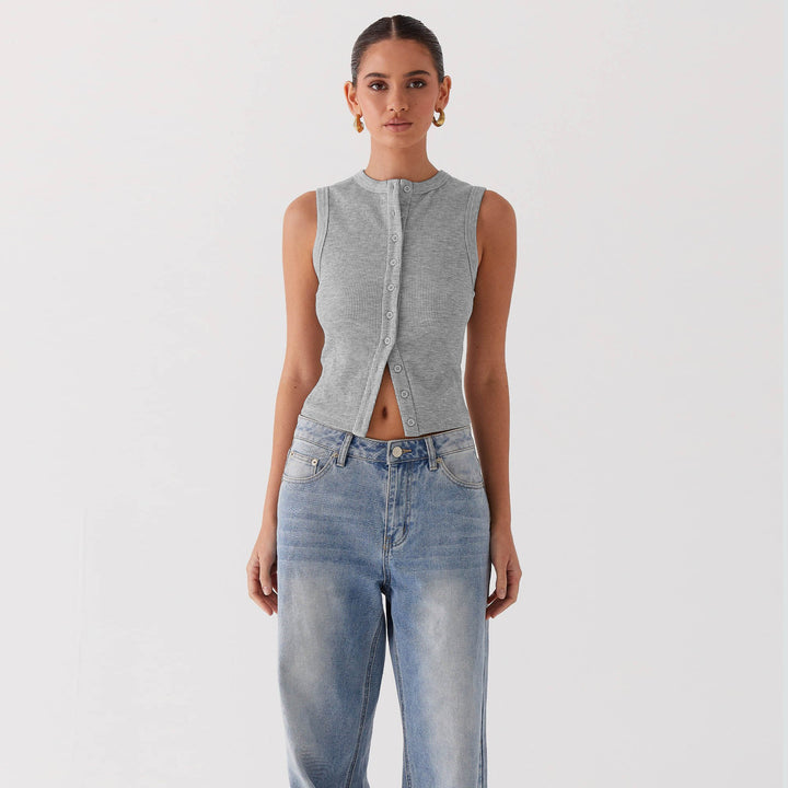Dame ærmeløs top med knapliste og moderne ribdesign Stilla